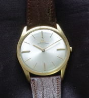 slim vintage Jaeger LeCoultre 18K manual wind